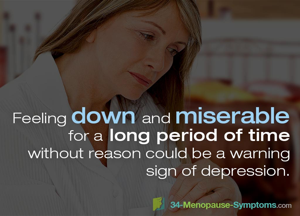 Feeling down and miserable for a long period of time without reason could be a warning sign of depression.
