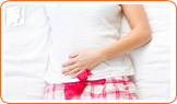 Heavier than normal bleeding is a symptom of irregular periods.