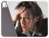 Woman looking at the screen: decrease in concentration ability is a main symptom of menopause